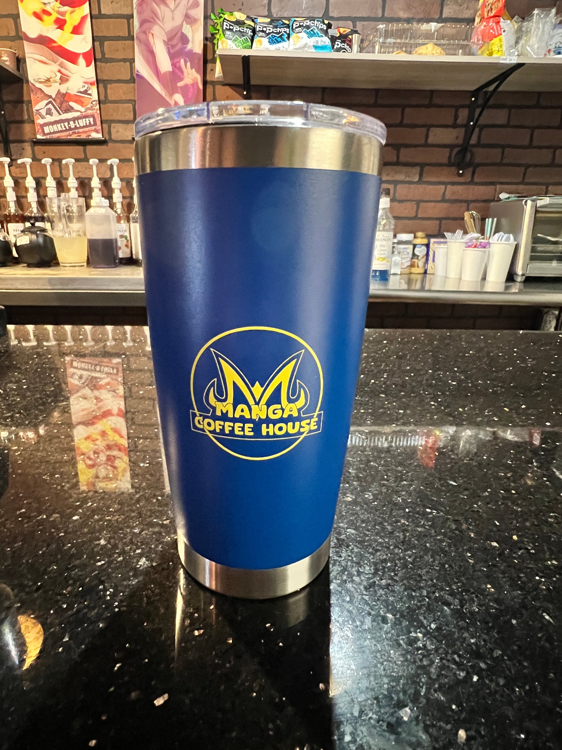 Manga Coffee House’s blue tumbler cup. Santa Fe, New Mexico